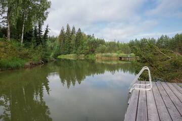 Фото номера Трехместный номер с видом на озеро Загородные дома Dzeni г. Аматциемс 38